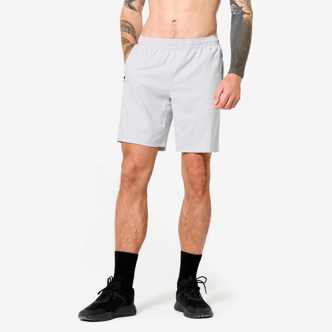 Short de fitness respirant poches zippées homme