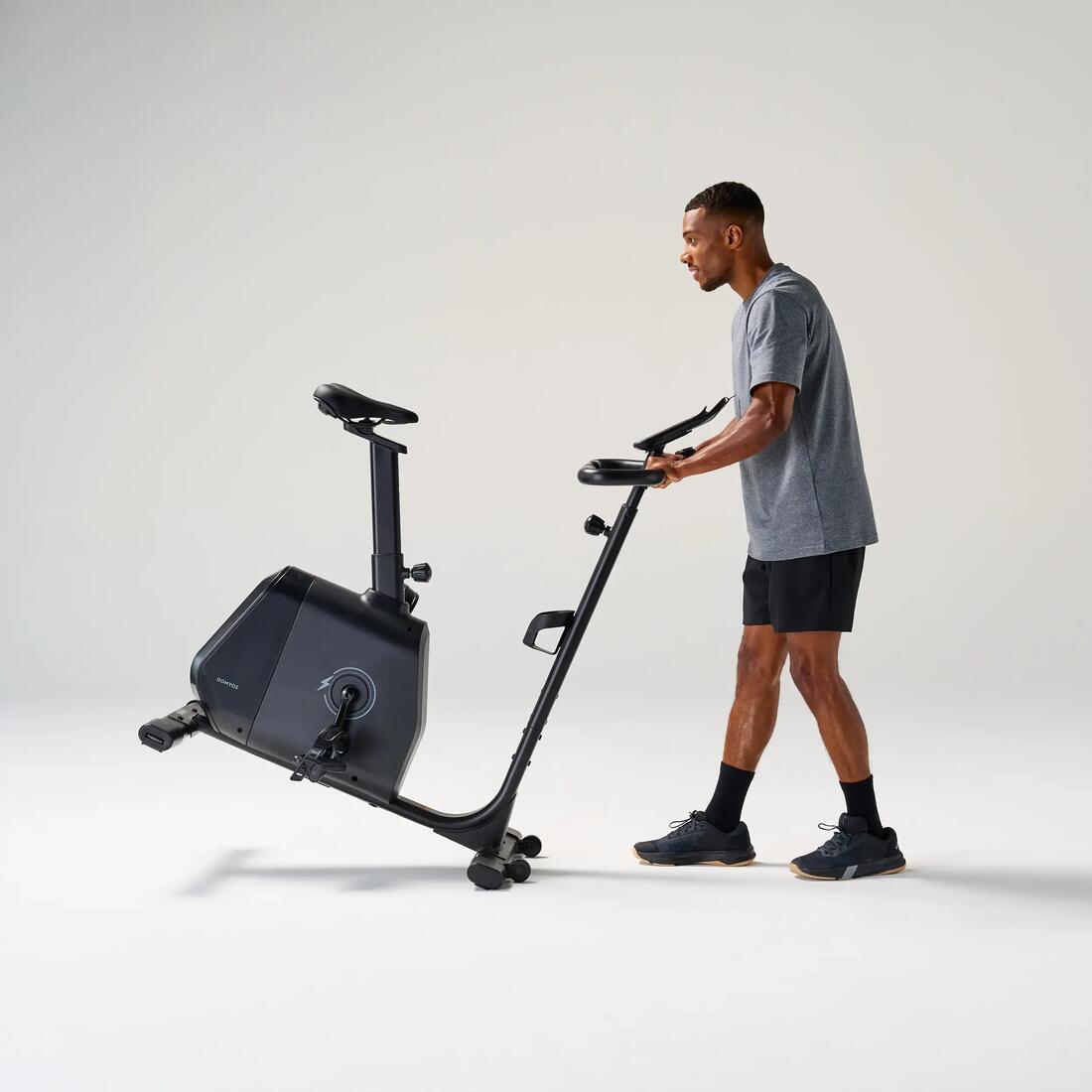 Vélo d'appartement avec résistance motorisée, EB520 B, garanti par Decathlon