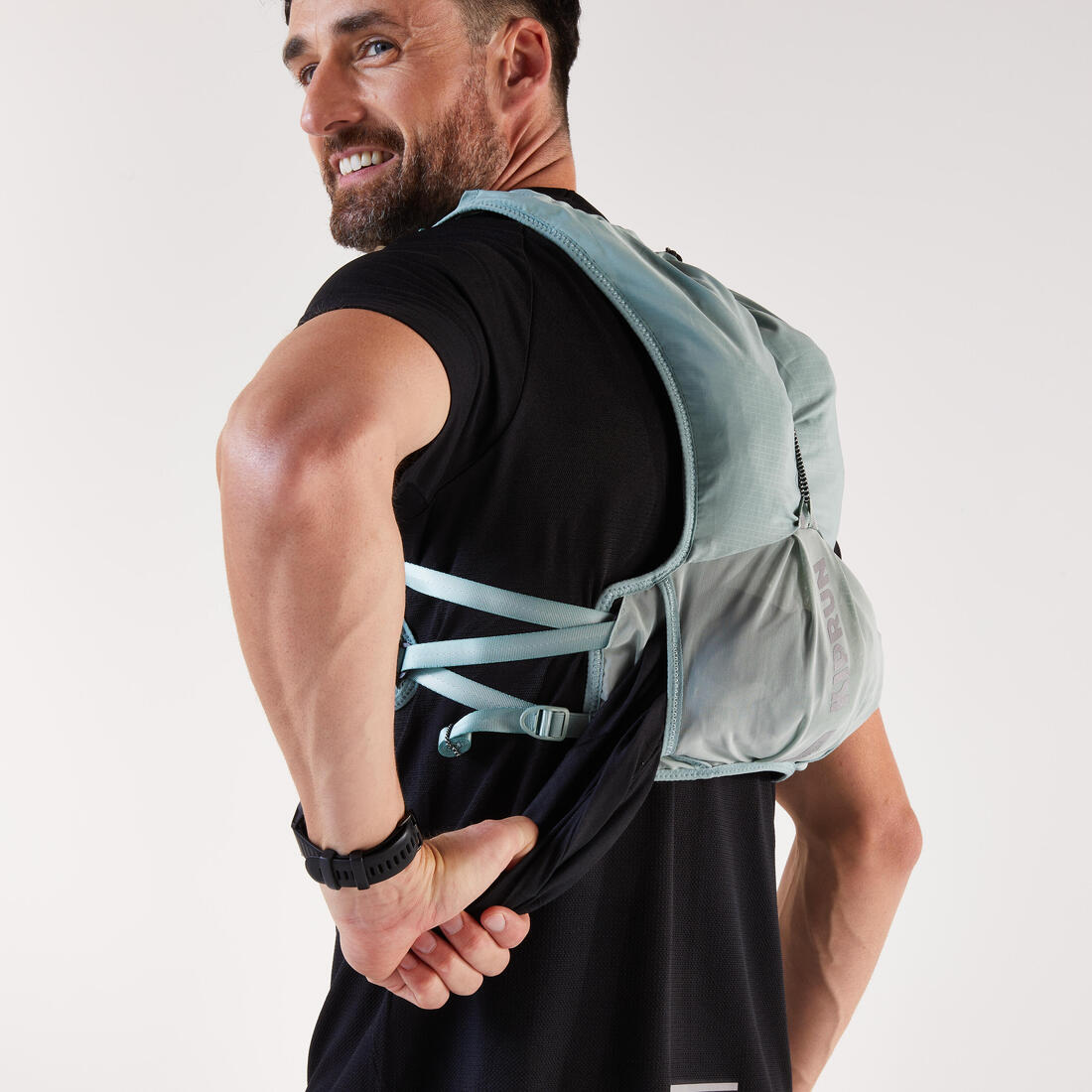 Sac trail running 5l turquoise - vendu avec poche à eau 1l