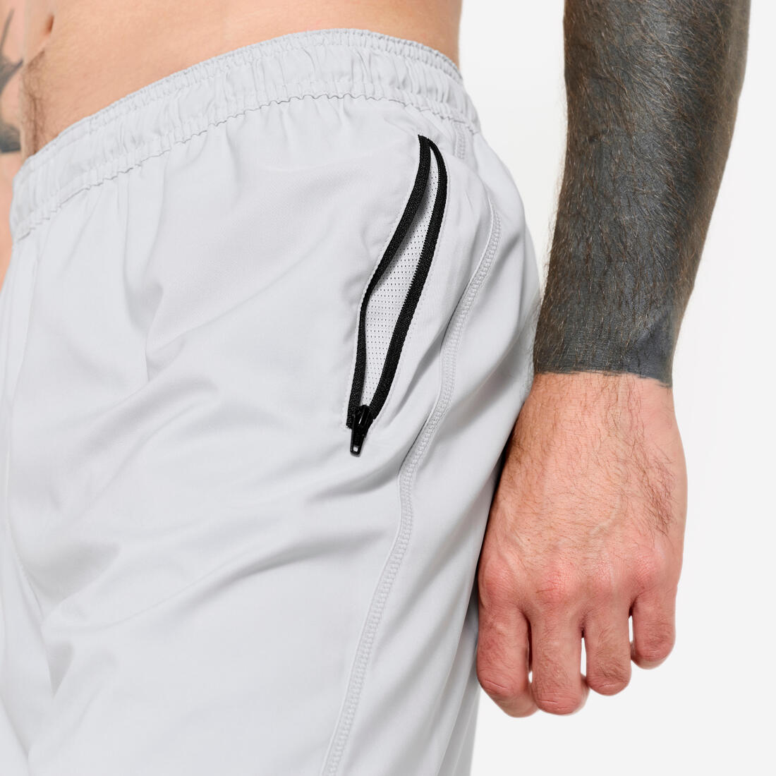Short de fitness respirant poches zippées homme