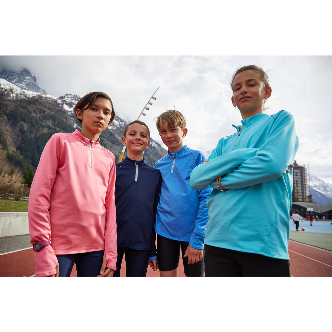 Maillot manches longues chaud 1/2 zip enfant d'athlétisme AT 100 corail fluo