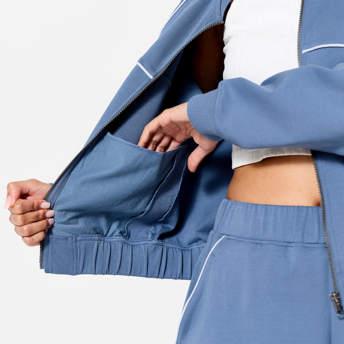 Veste bombers zipée femme, beige avec piping vert.