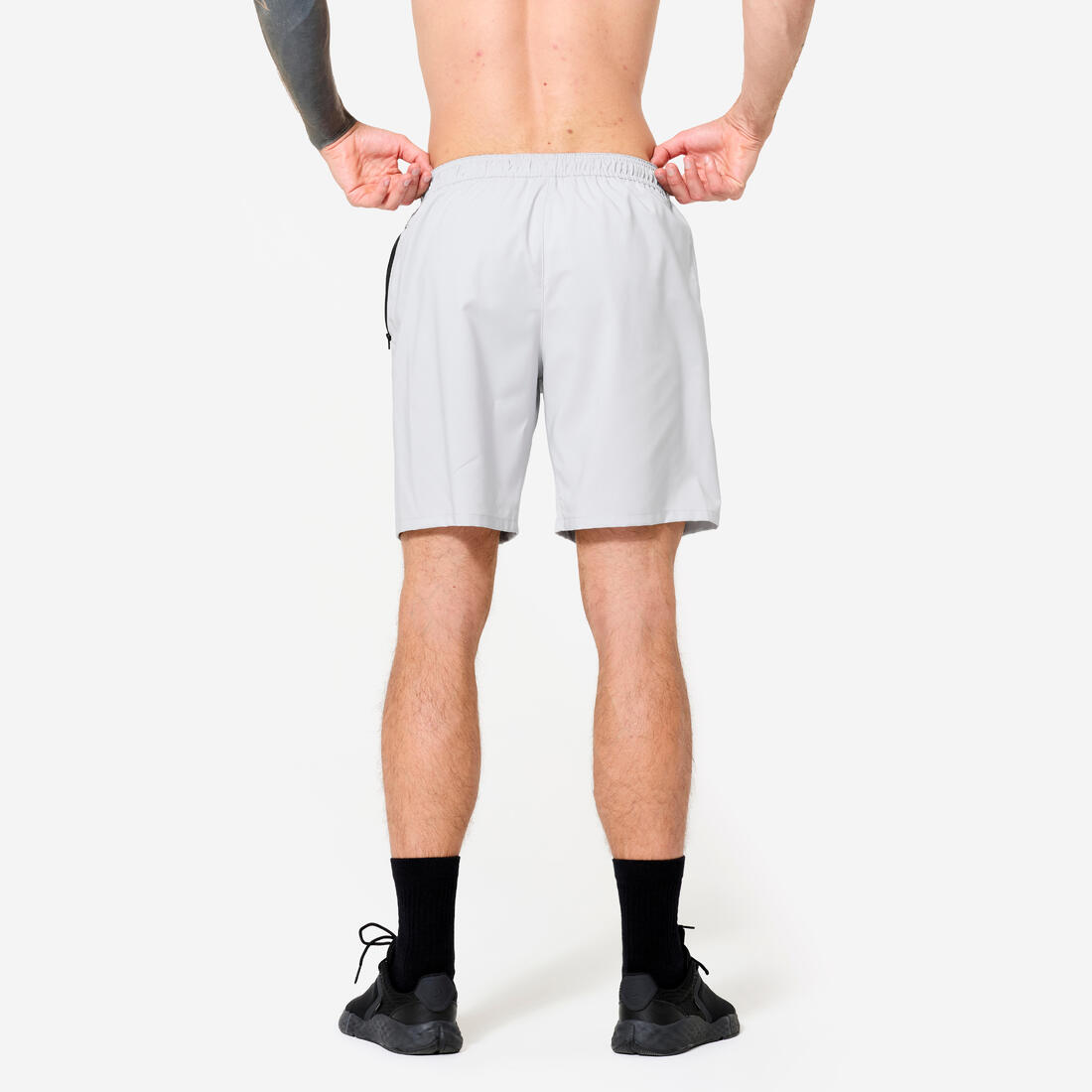 Short de fitness respirant poches zippées homme