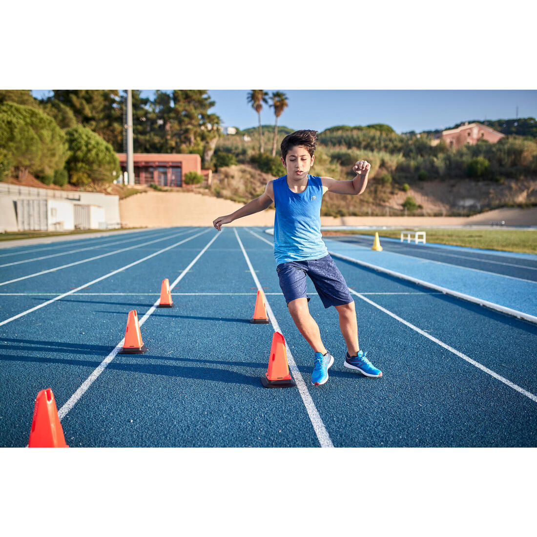 Débardeur running - athlétisme respirant garçon KIPRUN CARE bleu et rouge