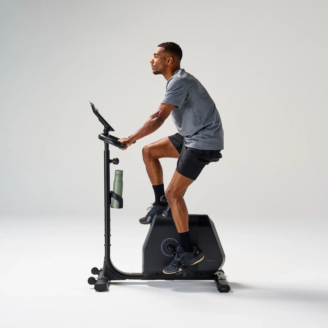 Vélo d'appartement avec résistance motorisée, EB520 B, garanti par Decathlon
