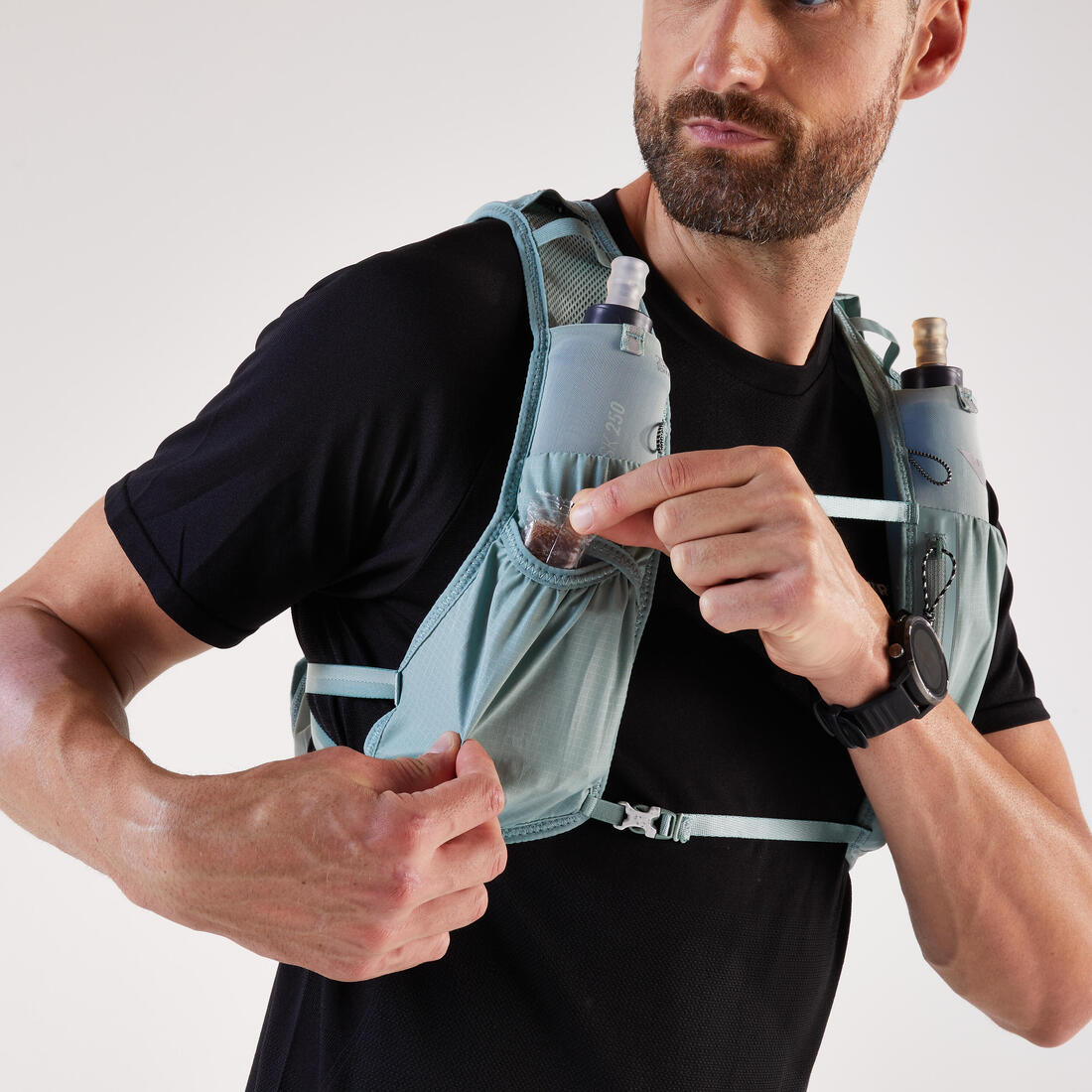 Sac trail running 5l turquoise - vendu avec poche à eau 1l