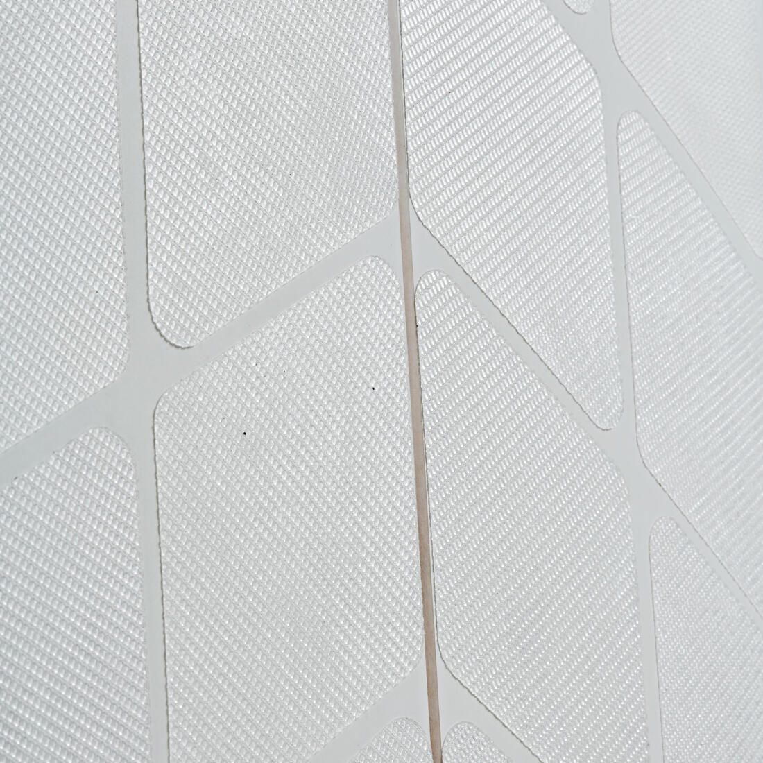 kit antidérapant PAD NOWAX pour planches de surf en résine.