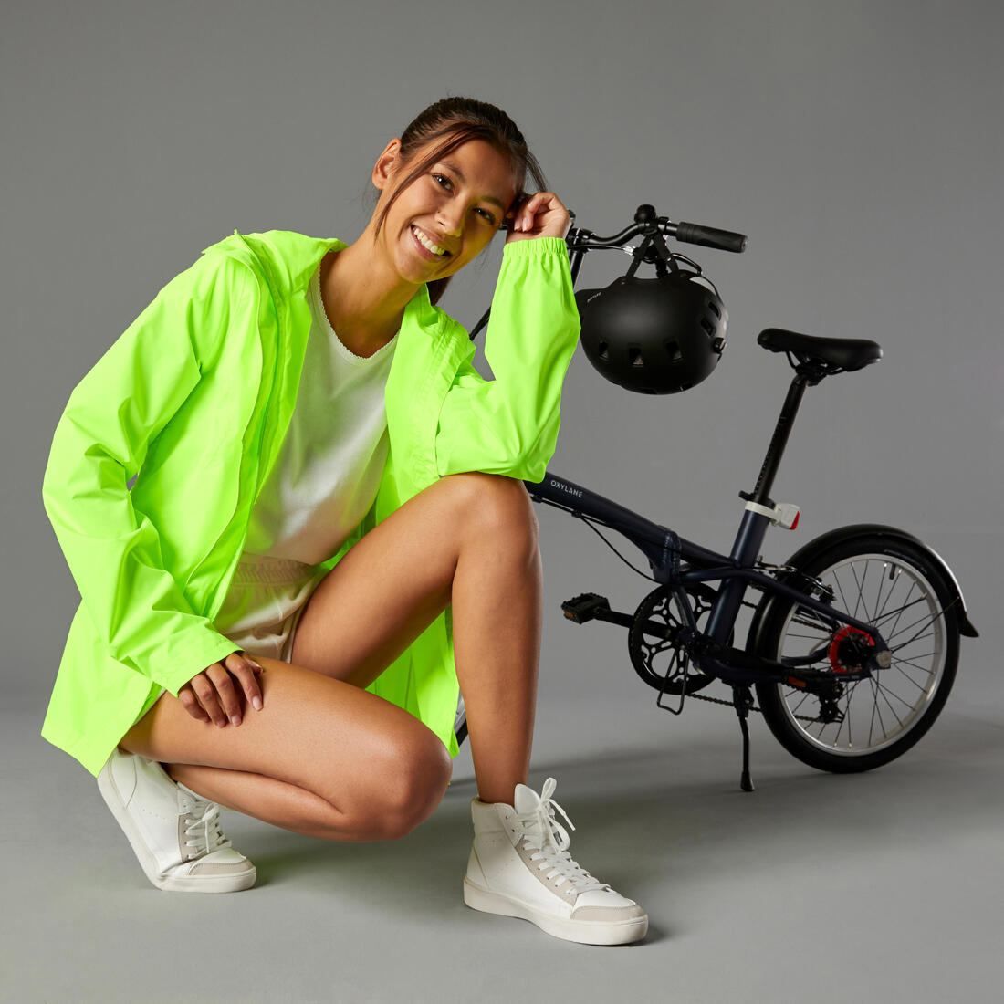 VESTE PLUIE VELO VILLE FEMME 120 JAUNE FLUO CERTIFIÉE EPI VISIBILITÉ JOUR