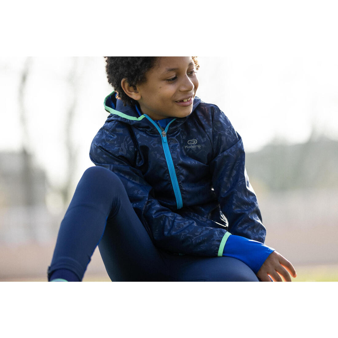 Veste coupe vent enfant pour l'athlétisme Kalenji AT 100 bleue