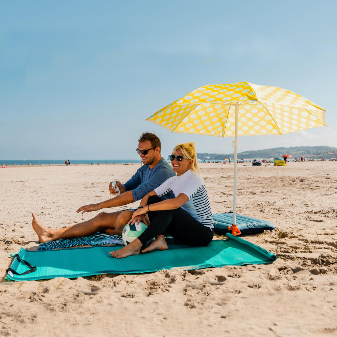 Natte de plage turquoise bleu