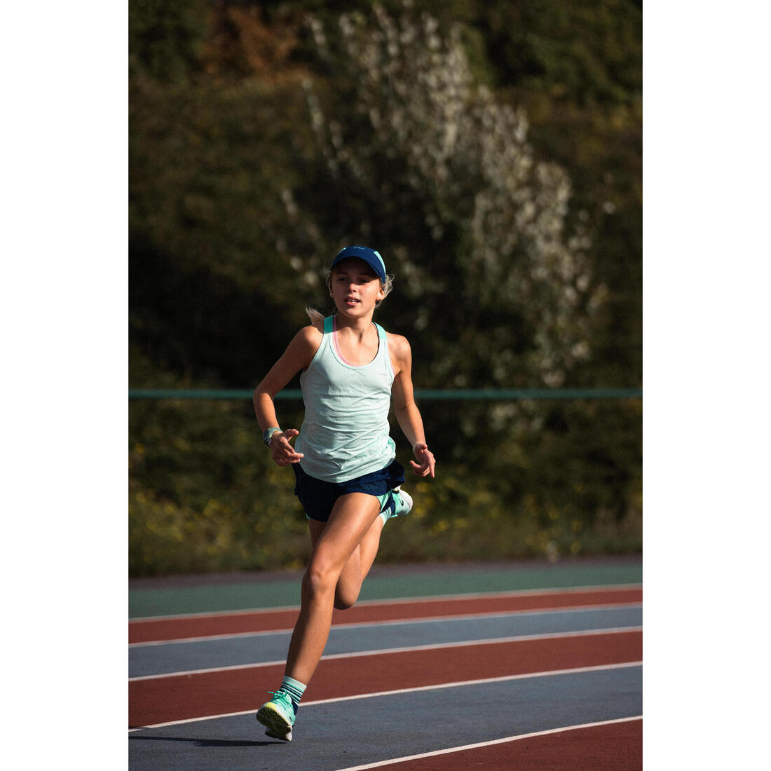 Short cuissard de running respirant Fille - KIPRUN DRY+ 2 en 1 marine et