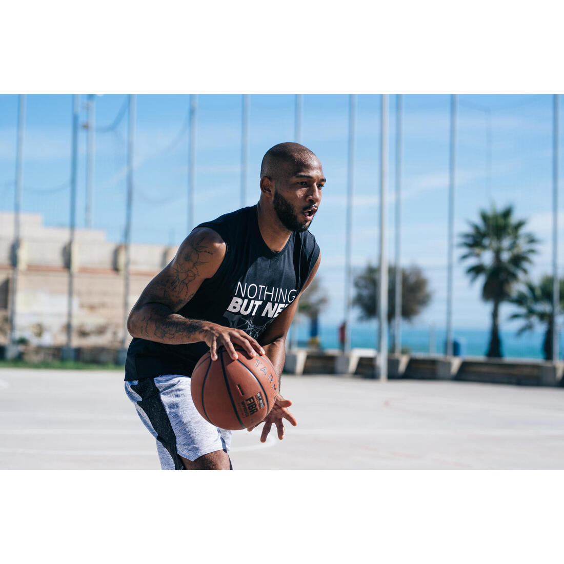 Ballon de basket BT500 taille 7 Marron Fiba garçon et homme à partir de 13 ans.