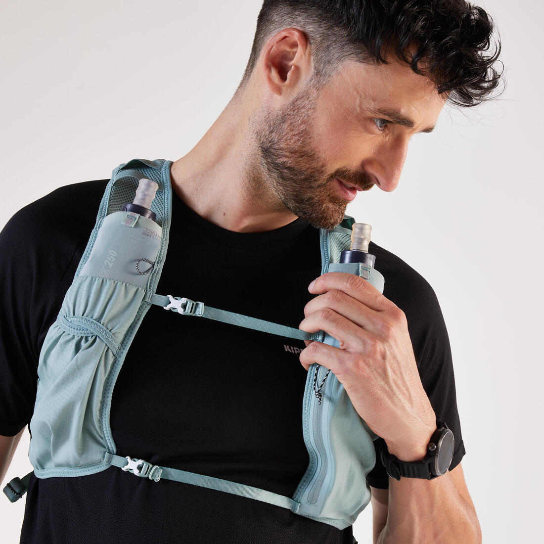 Sac trail running 5l turquoise - vendu avec poche à eau 1l