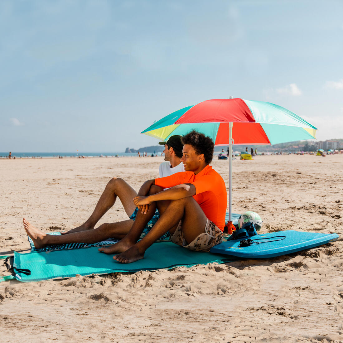 Natte de plage turquoise bleu