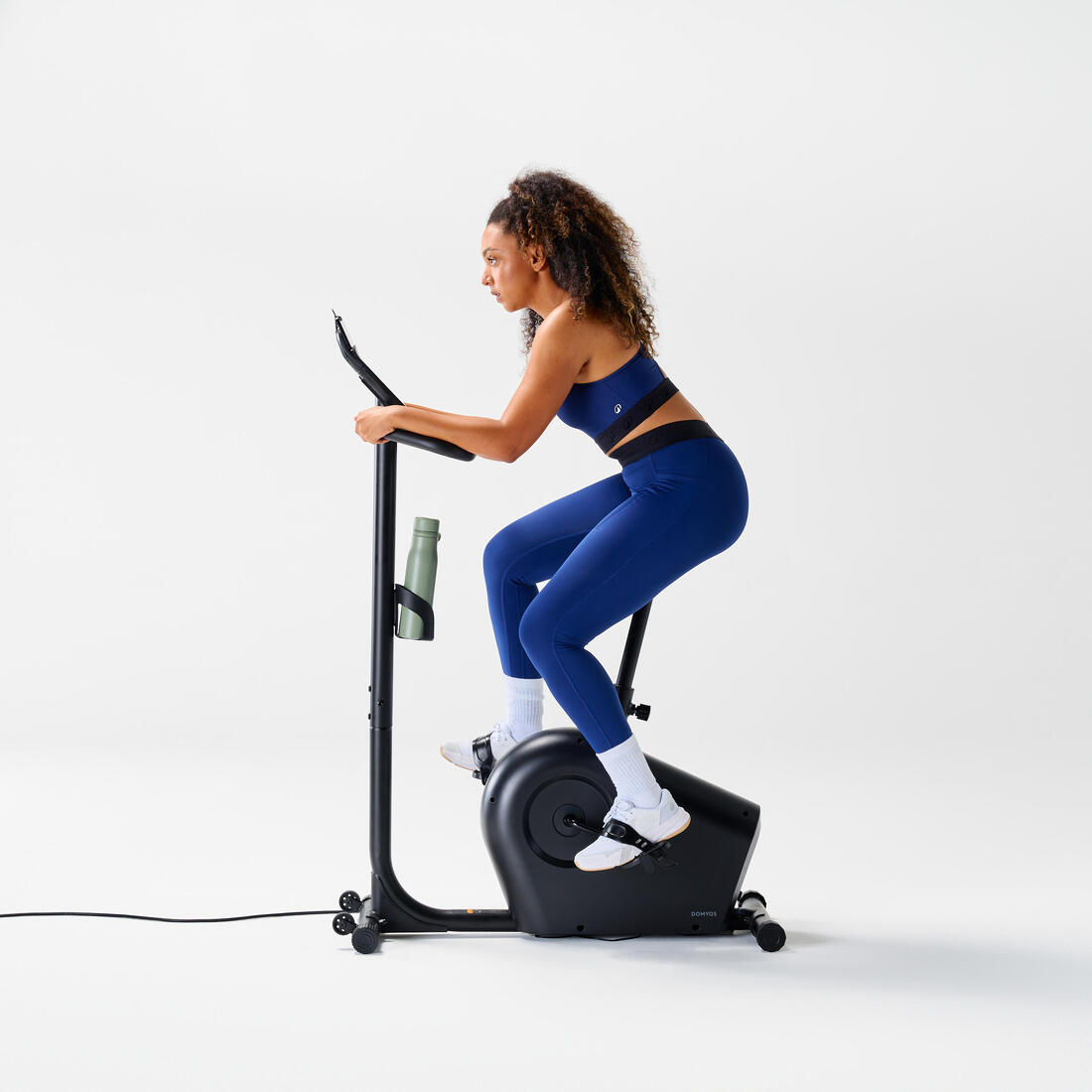 Vélo d'appartement avec résistance motorisée, EB140 B, garanti par Decathlon