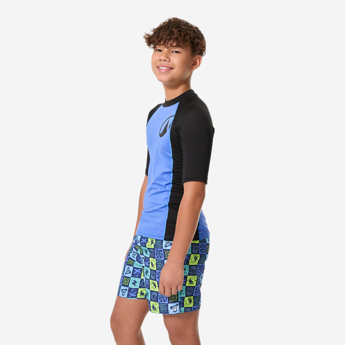 Top anti uv surf manches courtes garçon, 500 bleu et