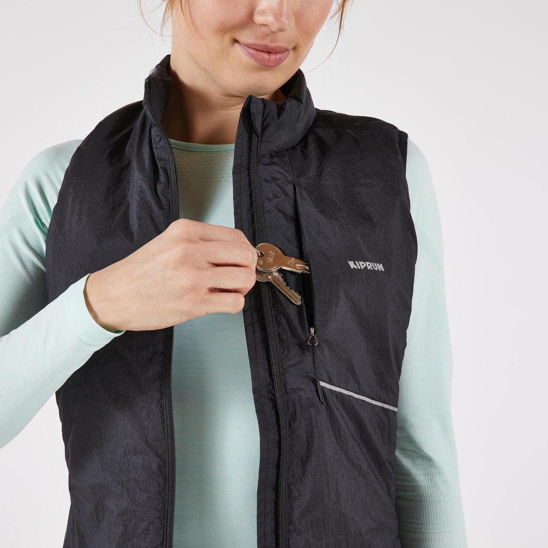 Veste sans manches chaude de running Femme, KIPRUN SM 500 Run warm noire