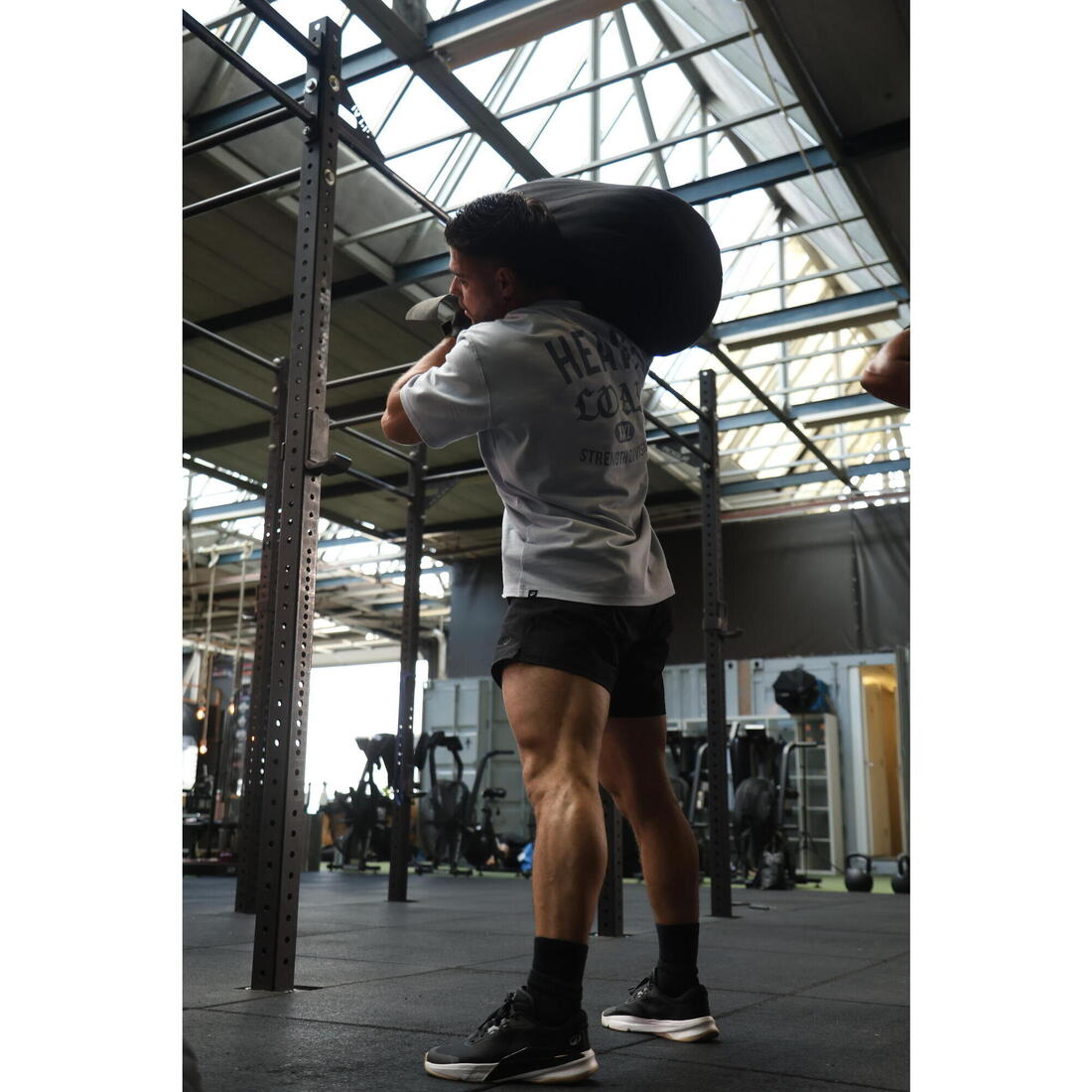 Short de fitness long 23cm homme, noir et