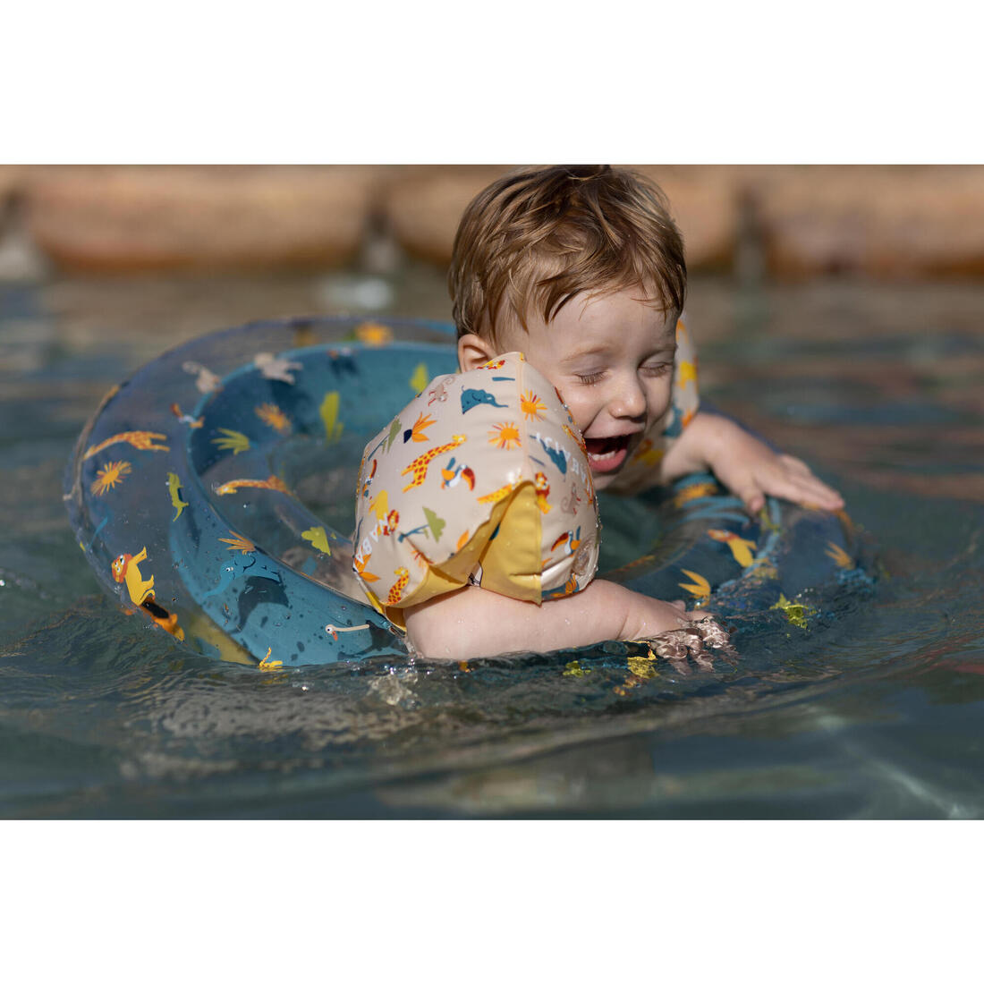 Bouée piscine gonflable 65 cm transparente savane