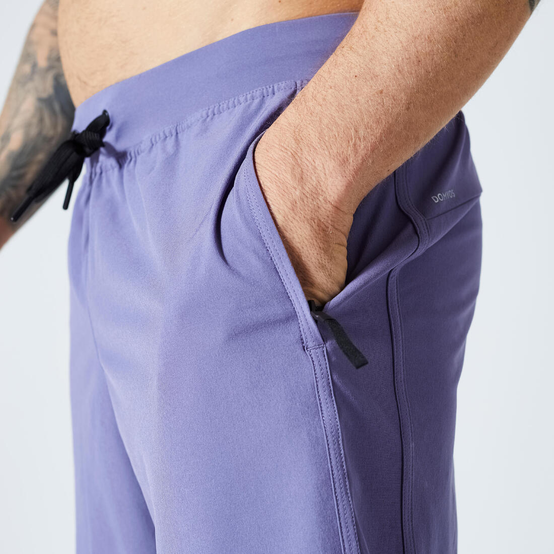 Short de fitness respirant poches zippées homme