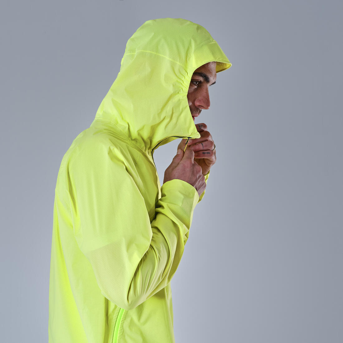 Veste imperméable ultra légère de randonnée rapide - FH 500 - homme  Jaune