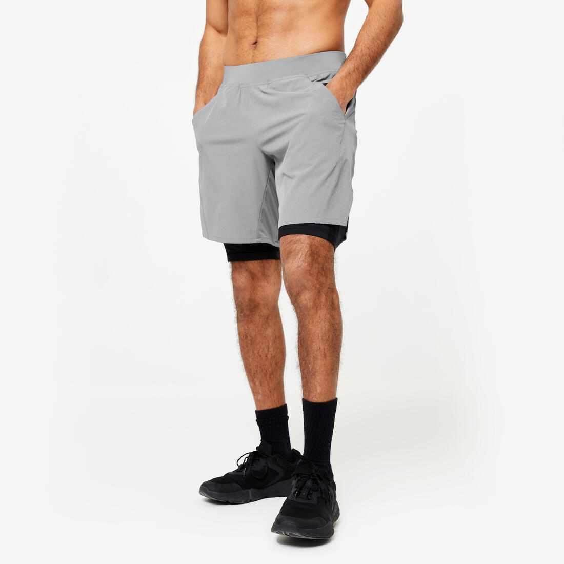 Short de fitness 2 en 1 collection respirant poche zippée homme