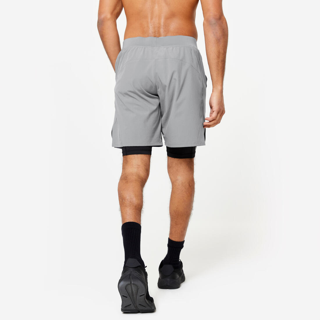 Short de fitness 2 en 1 collection respirant poche zippée homme