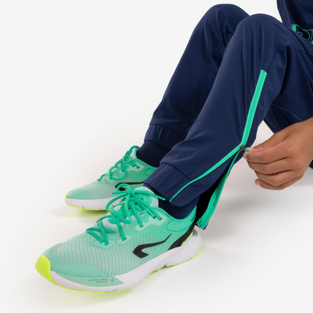 Pantalon de running avec zip Enfant - KIPRUN DRY+ marine vert