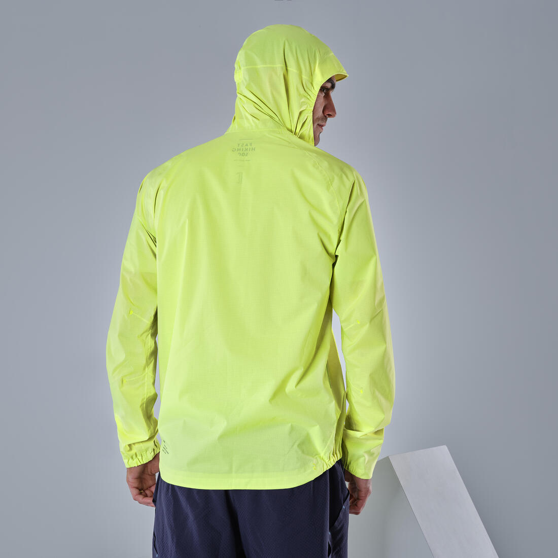 Veste imperméable ultra légère de randonnée rapide - FH 500 - homme  Jaune