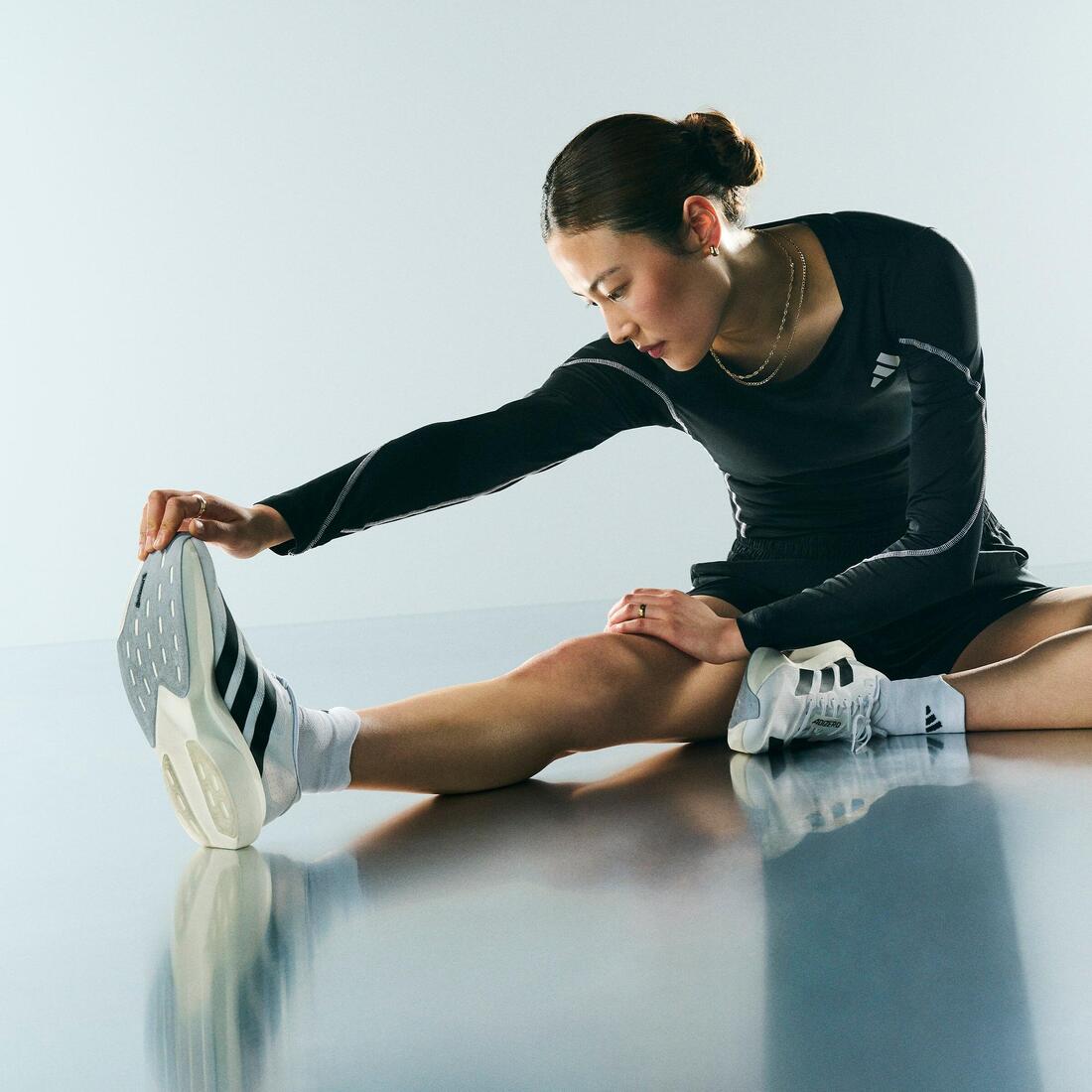 Chaussures running femme, adidas Adizero Evo SL noires et blanches