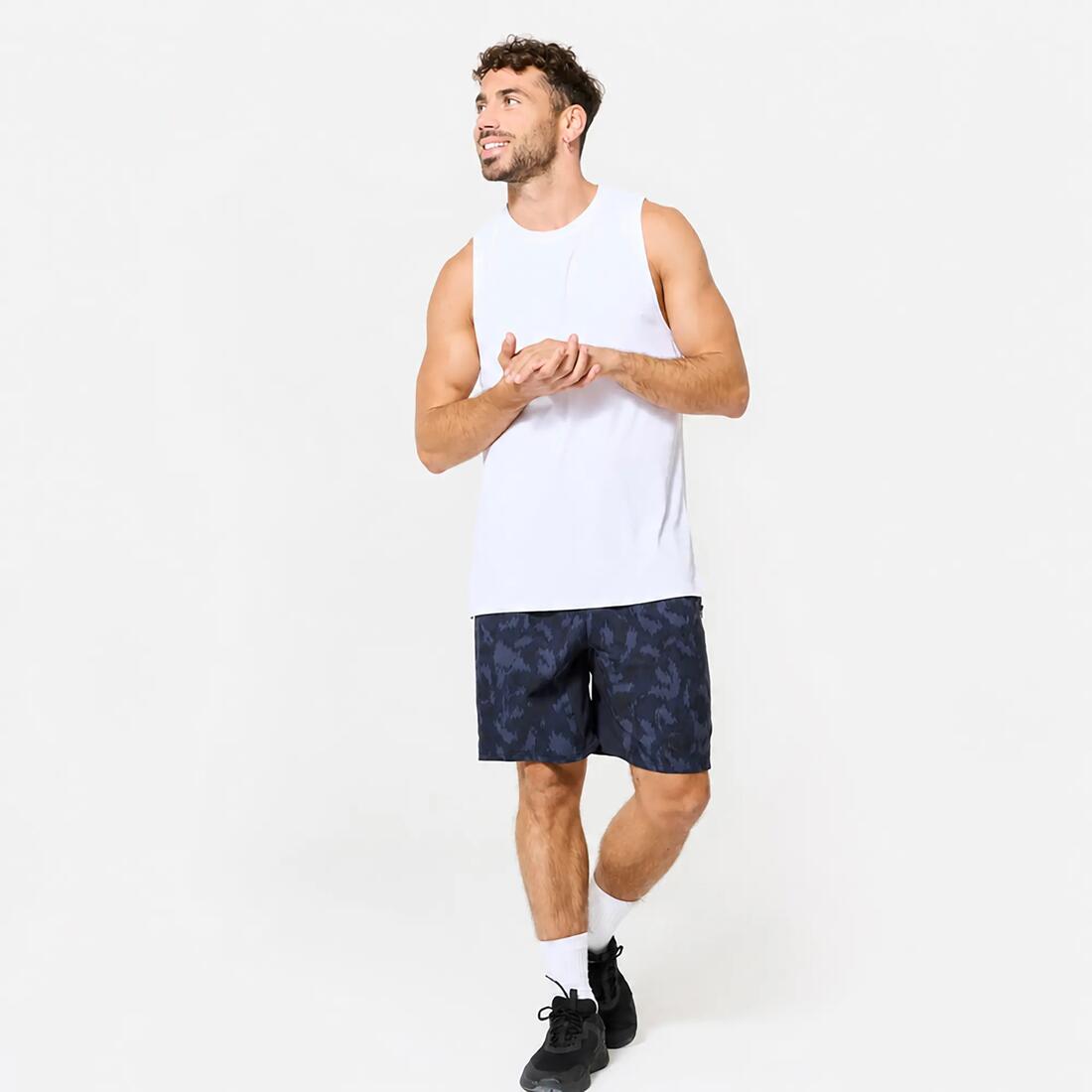 Short de fitness respirant poches zippées homme