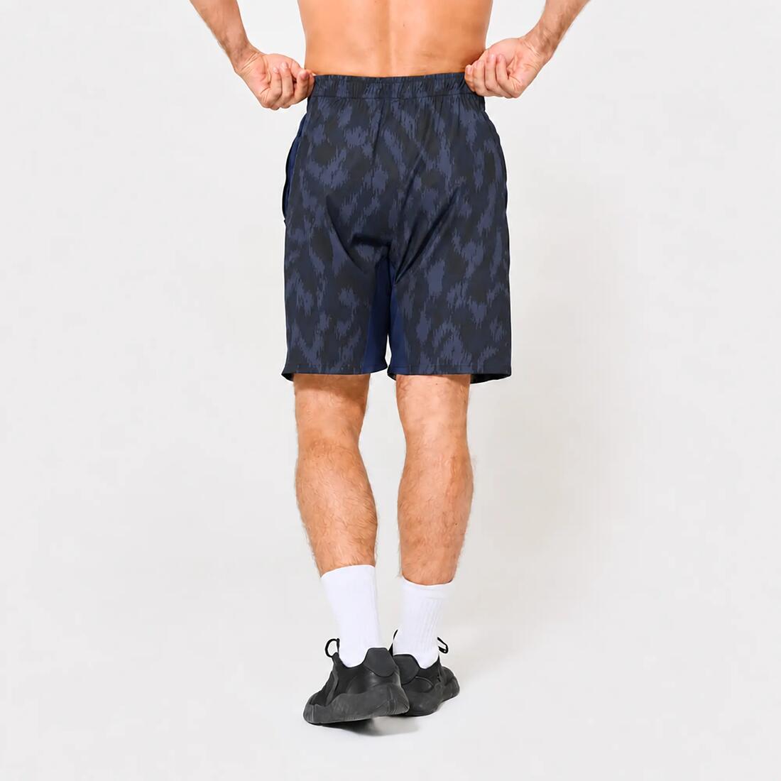 Short de fitness respirant poches zippées homme