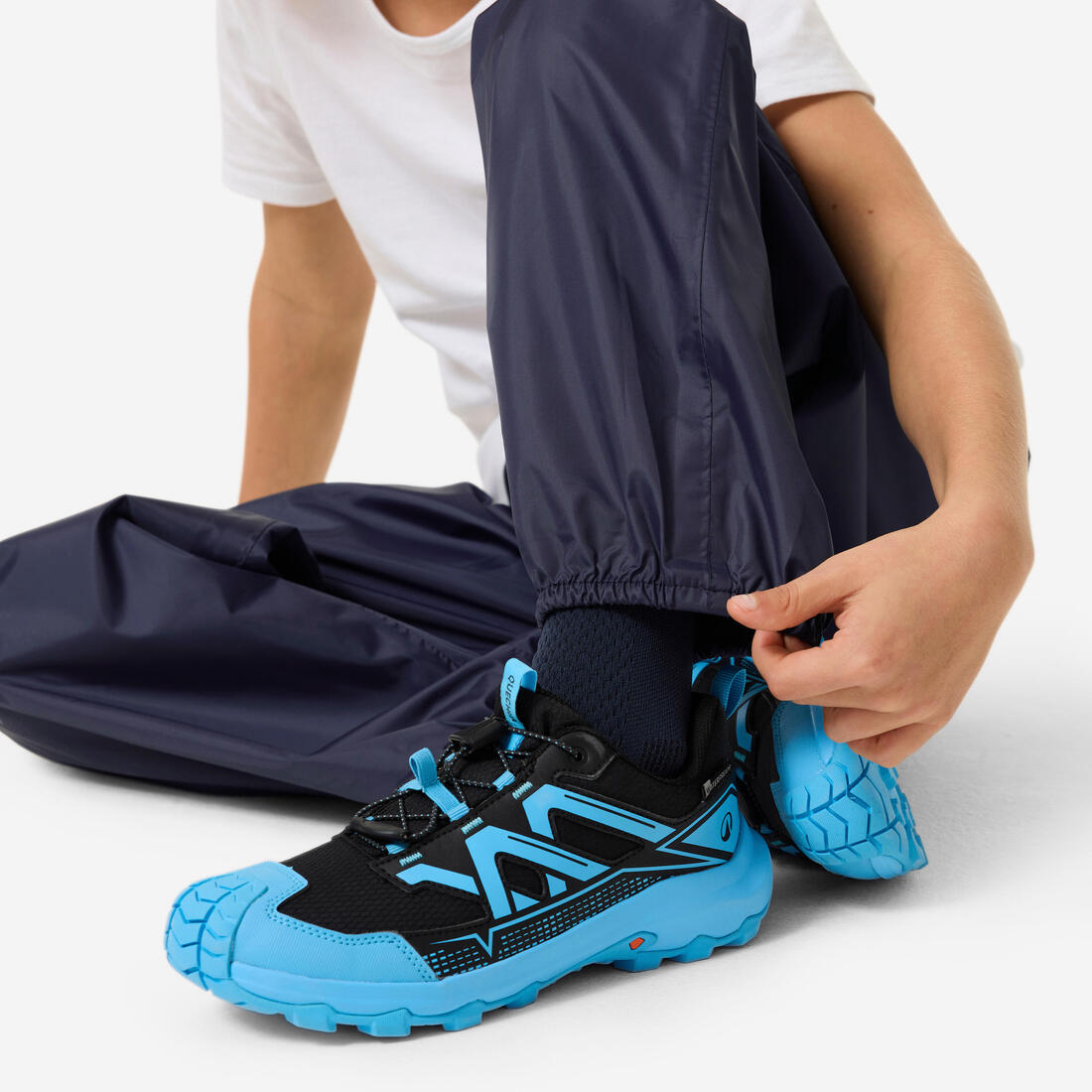 Surpantalon imperméable de randonnée enfant 7-15 ans, MH100 bleu marine