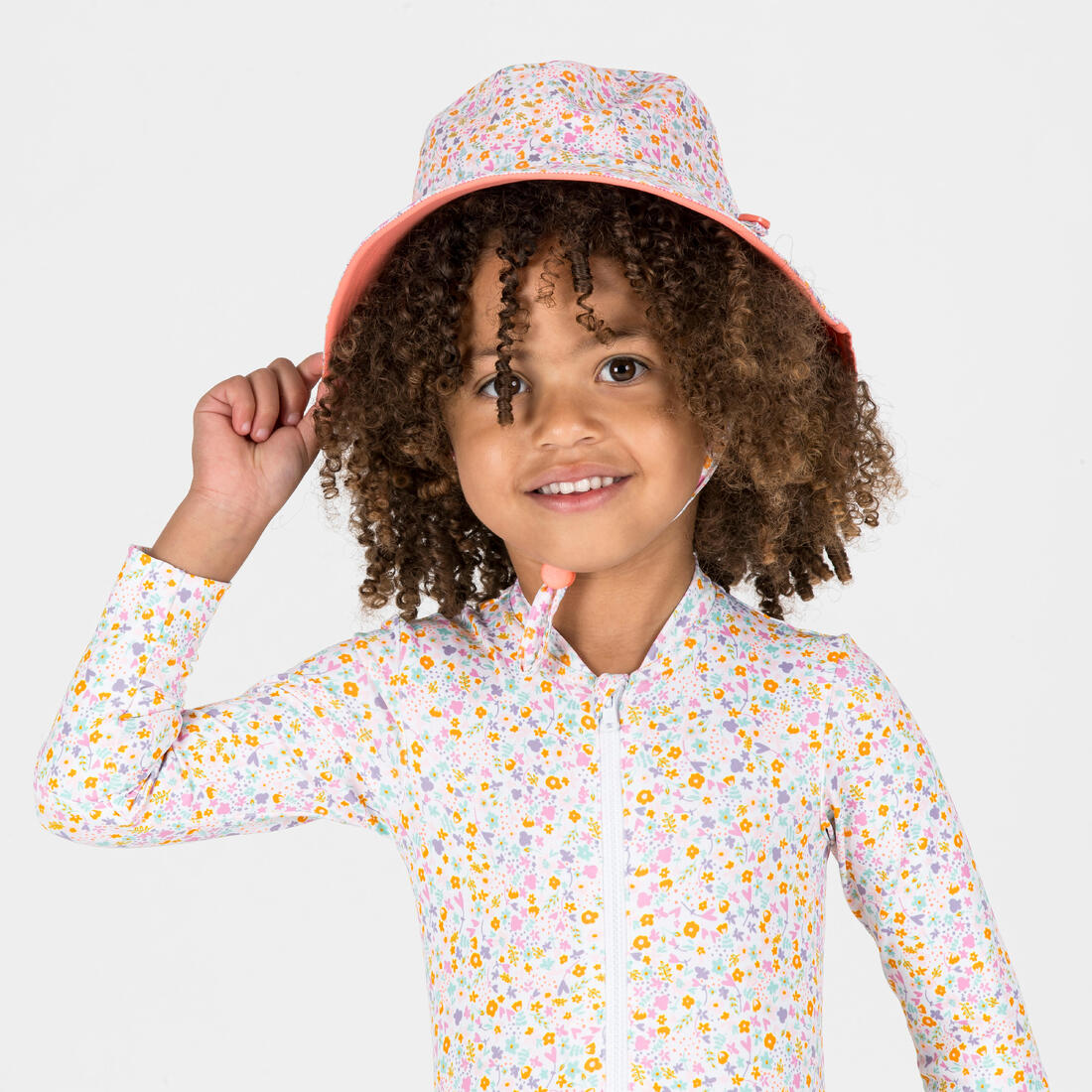 Chapeau anti uv bébé réversible jaune et bleu imprimé savane