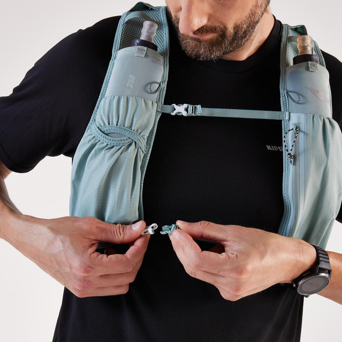 Sac trail running 5l turquoise - vendu avec poche à eau 1l