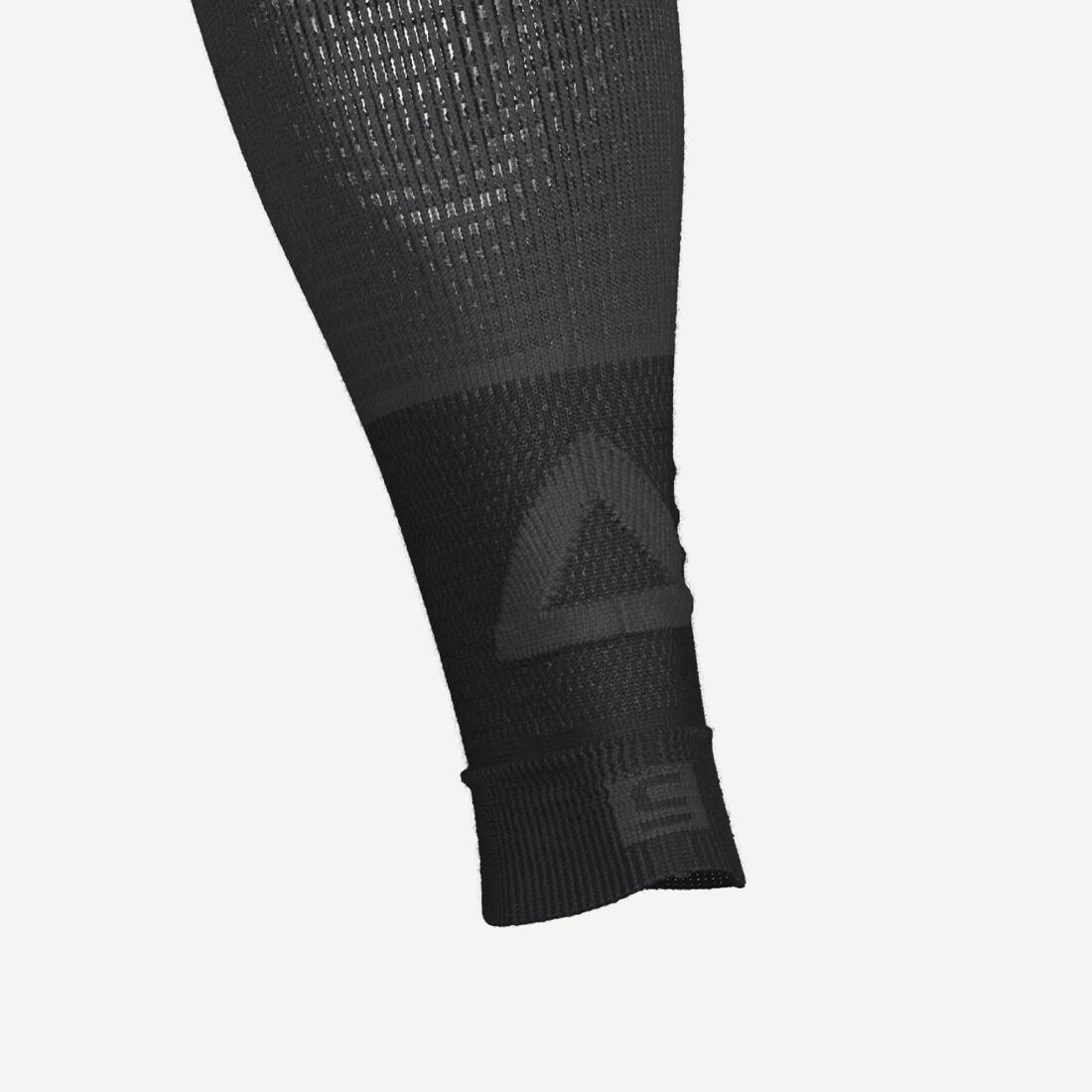 Manchon de compression running KIPRUN 500 noirs