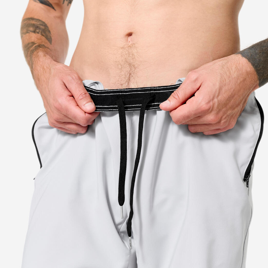 Short de fitness respirant poches zippées homme