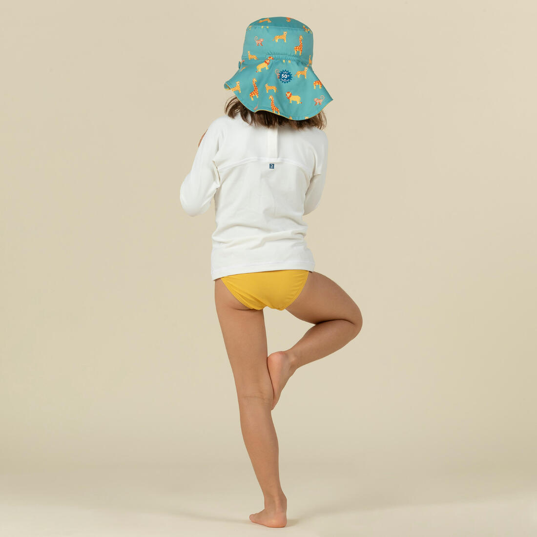 Chapeau anti uv bébé réversible jaune et bleu imprimé savane