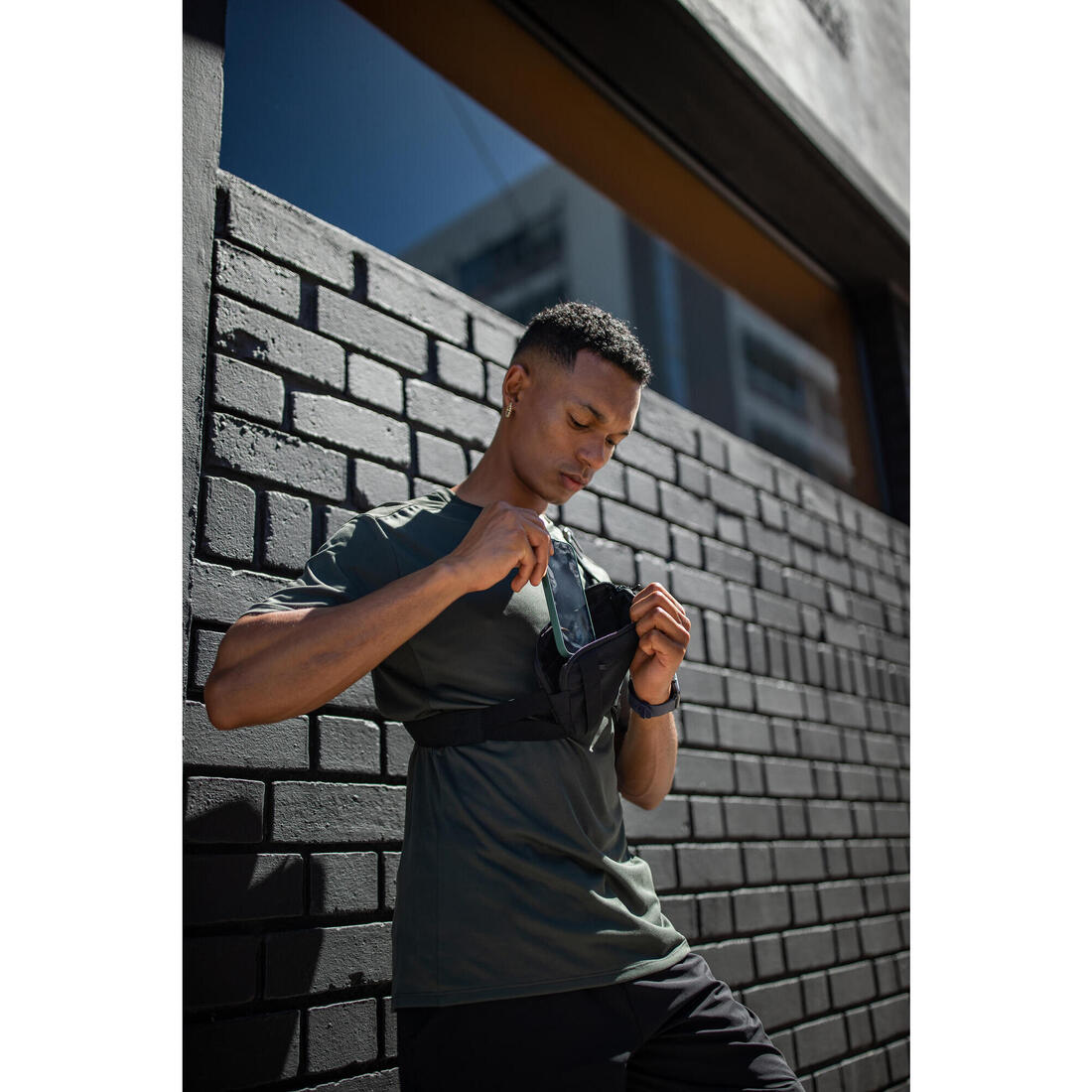 Sac running 2 positions Homme Femme- KIPRUN  0,5 L noir