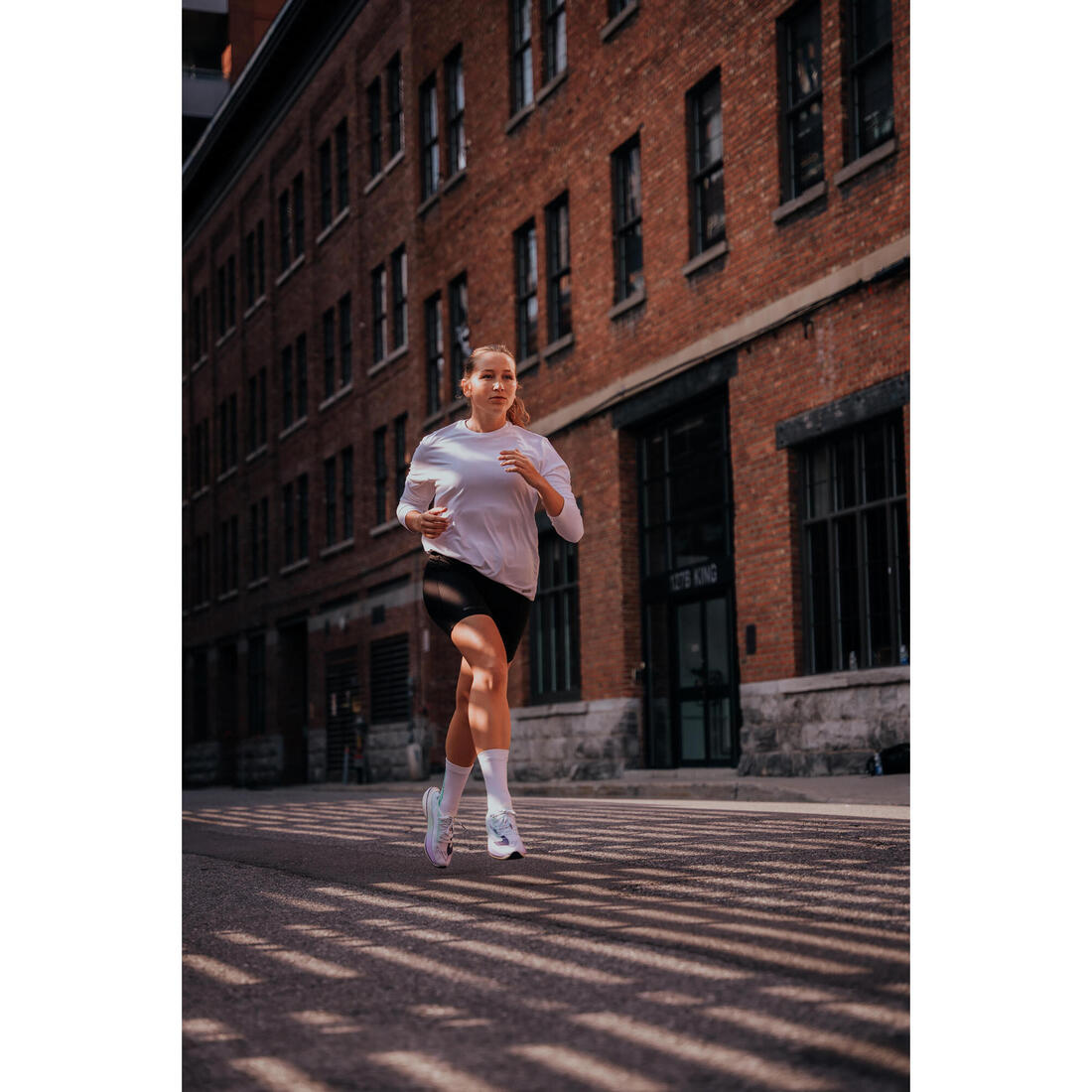 Short cycliste running femme - kiprun run 100 noir