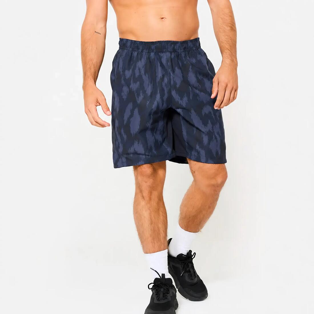 Short de fitness respirant poches zippées homme
