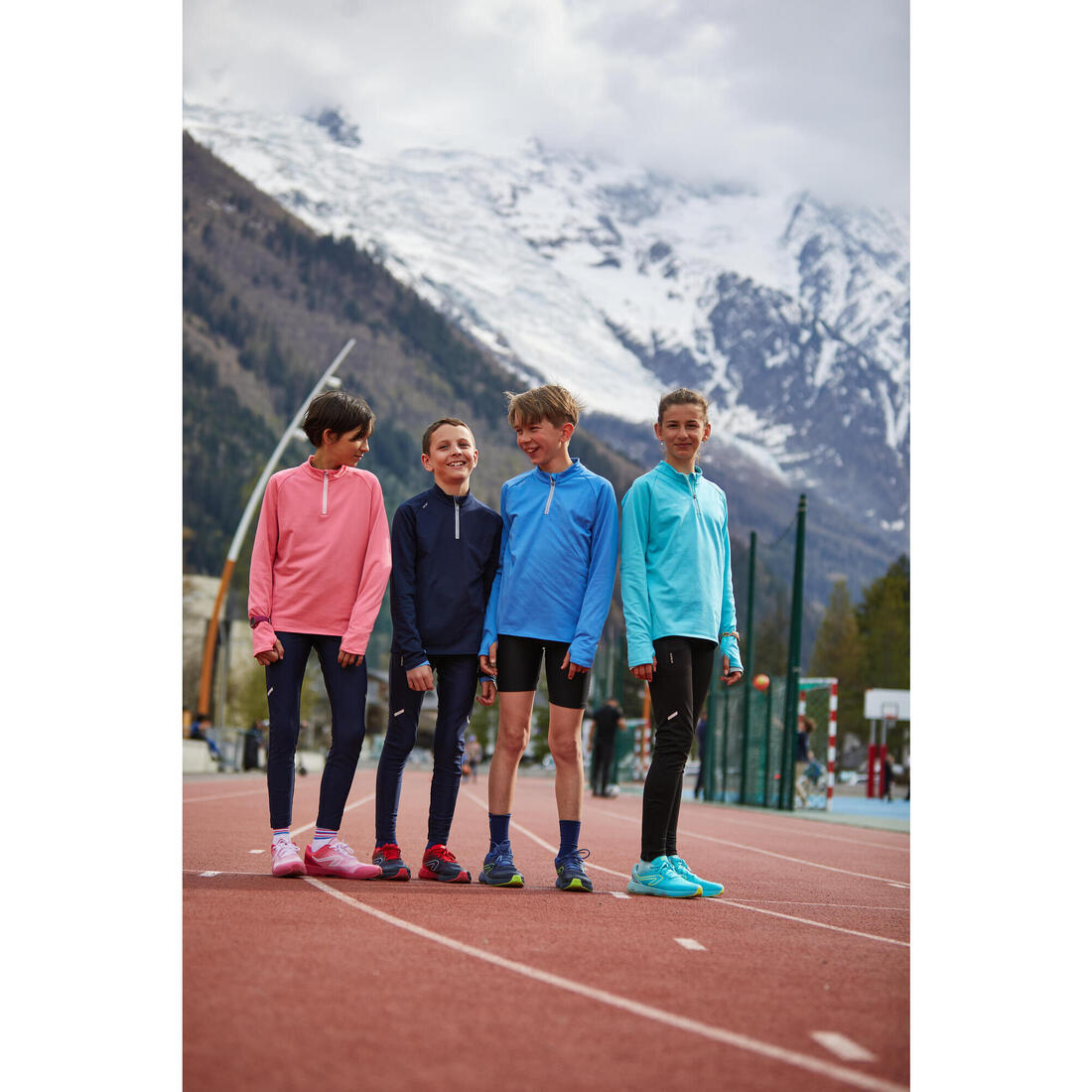 Maillot manches longues chaud 1/2 zip enfant d'athlétisme AT 100 corail fluo