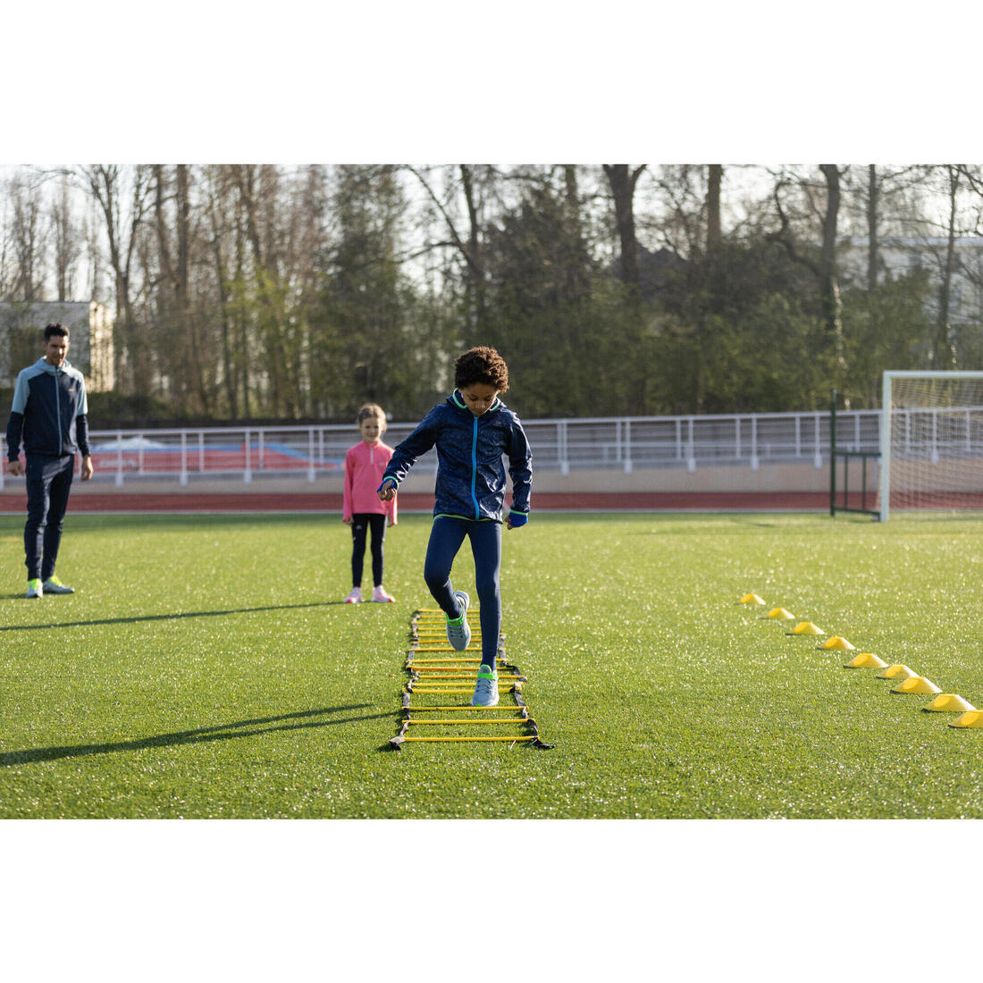Veste coupe vent enfant pour l'athlétisme Kalenji AT 100 bleue