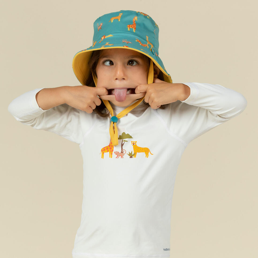 Chapeau anti uv bébé réversible jaune et bleu imprimé savane