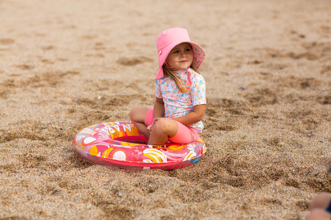 Chapeau anti uv bébé réversible rose clair et imprimé fleurs