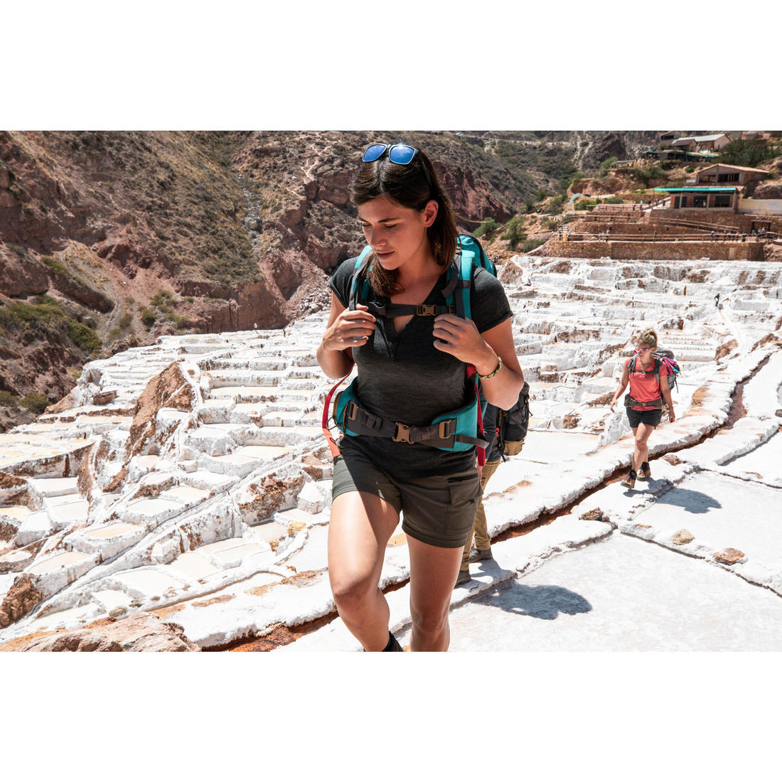 T-shirt de trek voyage - manches courtes - laine mérinos TRAVEL 500 corail Femme