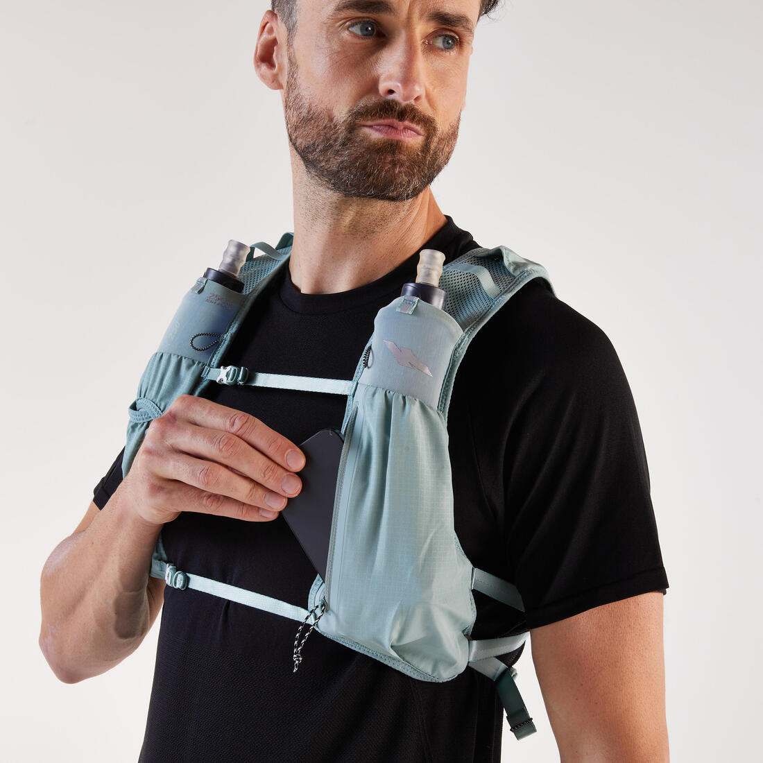 Sac trail running 5l turquoise - vendu avec poche à eau 1l