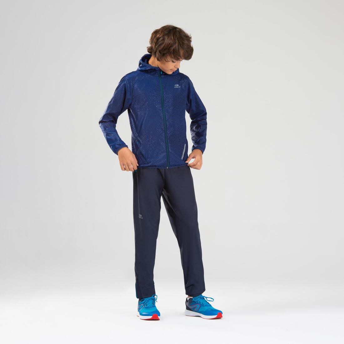 Veste coupe vent enfant pour l'athlétisme Kalenji AT 100 bleue