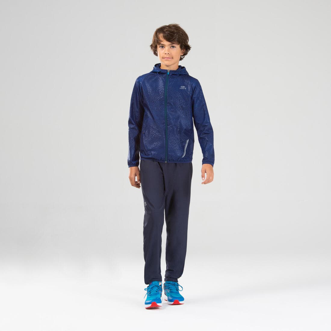 Veste coupe vent enfant pour l'athlétisme Kalenji AT 100 bleue